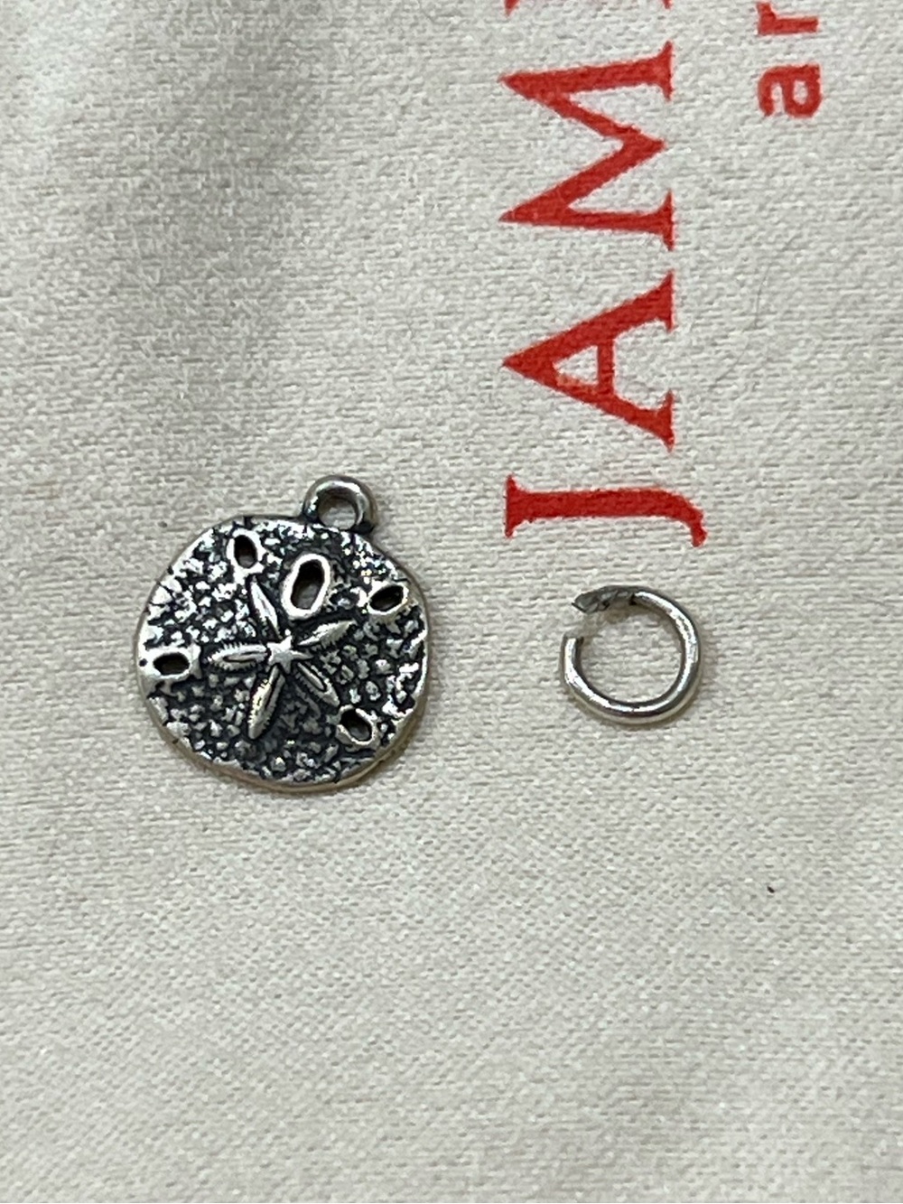 James Avery sand dollar charm